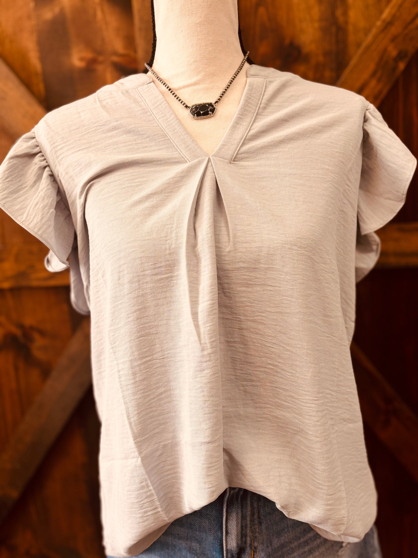 Woven AirFlow Ruffled Sleeve High-Low Top